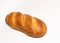 Long loaf of whole wheat breads on white background