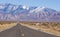 Long and lonely  road in the Mojave desert.