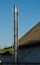 Long modern stainless steel chimney on the blue background