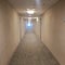 Long motel hallways carpet beige