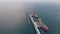 Long narrow berth for various huge tankers and ships