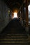 A long old stone stairway covered with a wood roof in Thun