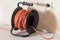 Long orange electrical extension cord