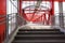 Long overpass over the road. Metal constructions. Red painted metal