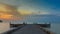 Long pier leading into the seacoast before sunrise