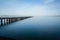 Long pier stretching out in the water