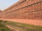 Long red coloured wall (monument - Red Fort)