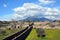 Long road and vesuvius cloudy sky from pompei city excavation italy