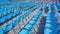 Long rows of blue seat chairs for local events observation