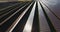 Long rows of photovoltaic panels at a solar farm