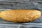 Long sesame bun bread, a fresh baked loaf of bread French Fino ready to fillings, typically filled with savory fillings, made from