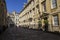 Long shadows cast on alleyway in courtyard