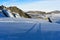 Long shadows of two persons on the Glacier du Tour