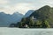 Long shot of Chateau de Duingt by the shore of Lake Annecy in France