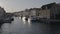 Long shot down the Nyhavn canal at sunset in Copenhagen, Denmark.