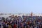 Long shot showing sea, boats, crowd and huge Ganapati idol, Girgaon Chowpatty