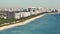 Long steady aerial of calm and tranquil florida beach in the summer