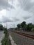 Long and straight train rail on gravel