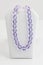 Long strand of large oblong faceted purple beads