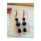 Long stylish earrings with blue lapis lazuli.