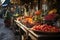 A long table on the market filled with lots of fruits and vegetables