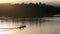 Long tail boat sailing on river