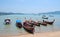 Long-tail boats docking at Chalong port in Phuket, Thailand