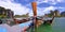 Long tail boats at the floating pier of East Railay