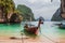Long tail tourist boats on sea shore near Koh Hong island in Krabi province