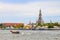 A long-tailed boat is sailing on the Chao Phraya River. It\\\'s a quick water journey in Bangkok