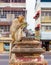 Long tailed macaque monkeys relaxing at Prang Sam Yot temple ruins. Lopburi, Thailand travel destinations