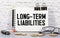 Long-Term Liabilities text concept isolated over white background