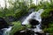 Long-term photos of a river through stones and  the green nature in norway