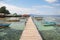 Long timber pier and boats