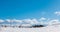 Long time lapse of clouds over winter landscape