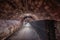 Long underground brick tunnel in the wine cellar