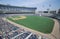 Long view of Baseball diamond and bleachers