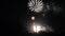 Long view of fireworks display showing ground firing to explosions in the sky