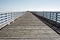 Long View of a Pier with Blue Skies in San Simeon CA