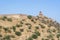 The long wall on the mountain of Amber fort in historical city of Amer, Jaipur, Rajasthan, India