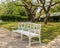 Long White Chair under The Shadow of Big Tree