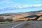 Long and winding road through the rolling hills of Central Oregon