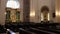 Long wooden benches in a catholic church interior