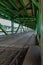 Long wooden and metal Gdanski bridge with tram rails and green roof