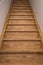 Long wooden stairs, modern house interior close-up