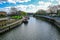 Longboats moored on waterway near Three Mills