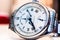 Longines hand watch, macro, luxury watch company, Longines winged hourglass logo registered in 1889 is oldest unchanged trademark