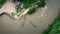 Longneck karen village in the mountain with boat on the river. Mae Hong Son, Thailand. Aerial shot