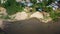 Longneck karen village in the mountain with boat on the river. Mae Hong Son, Thailand. Aerial Shot