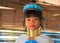 LONGNECK KAREN VILLAGE, THAILAND - DECEMBER 17. 2017: Close up portrait of long neck girl with brace neck rings